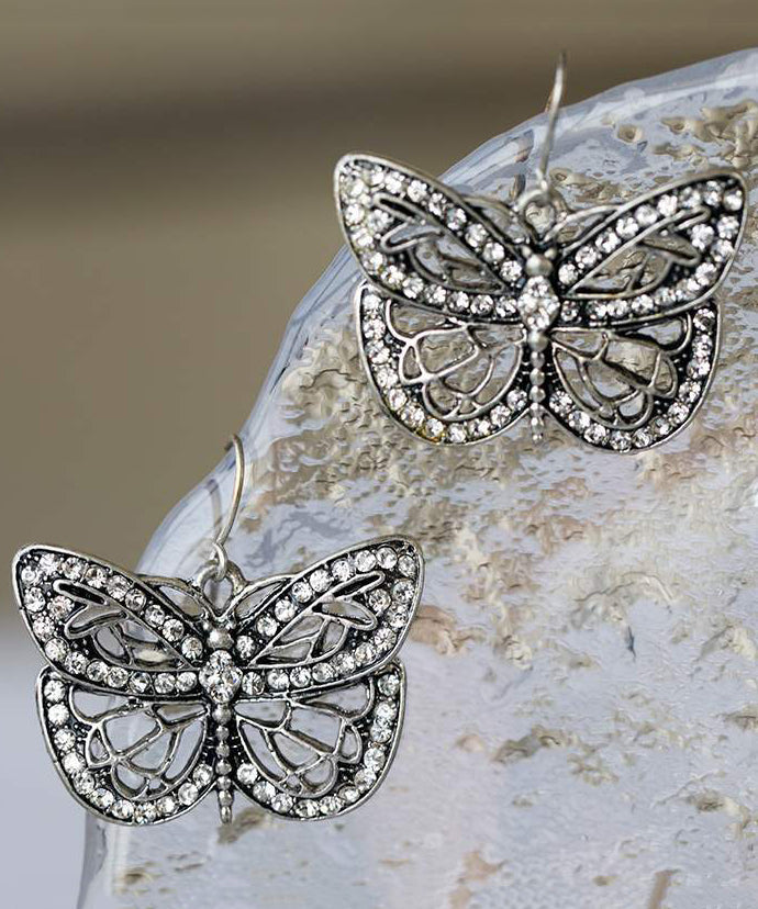 Retro White Metal Zircon Butterfly Hollow Out Stud Earrings