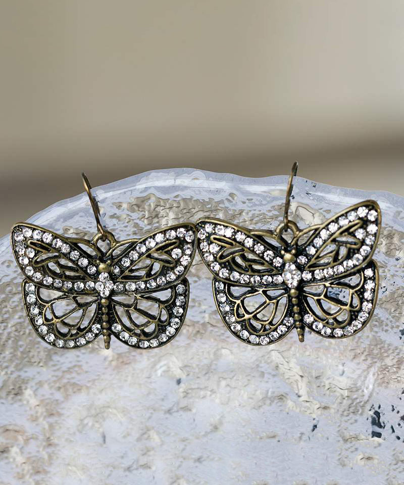 Retro White Metal Zircon Butterfly Hollow Out Stud Earrings