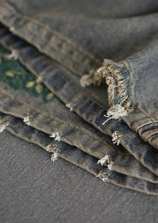 Pantalon denim à la colonne large brodée d'origine